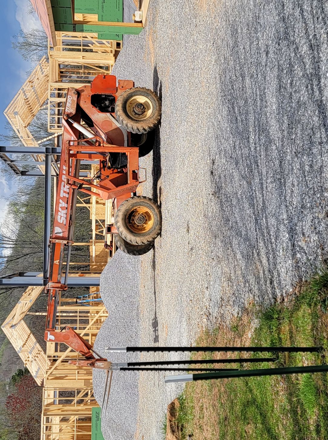 Sky Trak telehandler on a house framing construction site